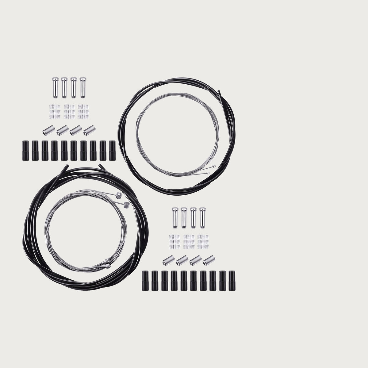 Black brake and shift cable housing coils with inner wires, end caps and ferrules