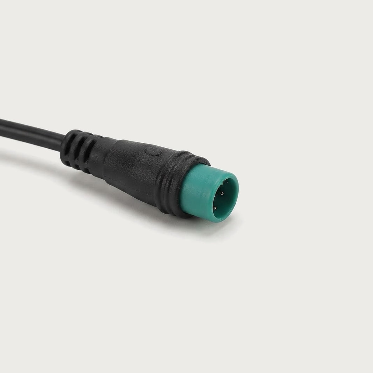 Close-up of the waterproof round connector on the display cable