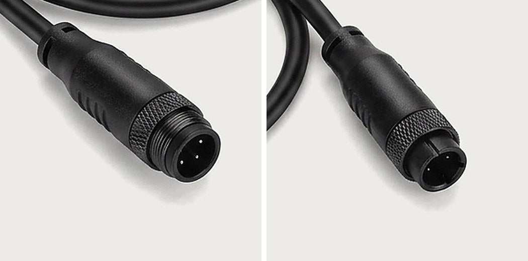 Close-ups of a 10-pin round hub motor plug with a knurled metal screw ring: male plug on the left, female plug on the right